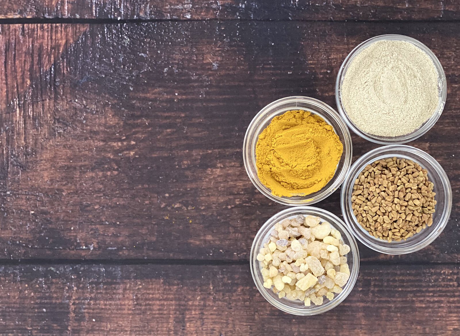 Ubtan Body Scrub 200g — Turmeric and spices in bowls